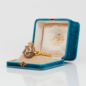A Dutch late 19th century bracelet/brooch set with old-cut diamonds and sapphires.