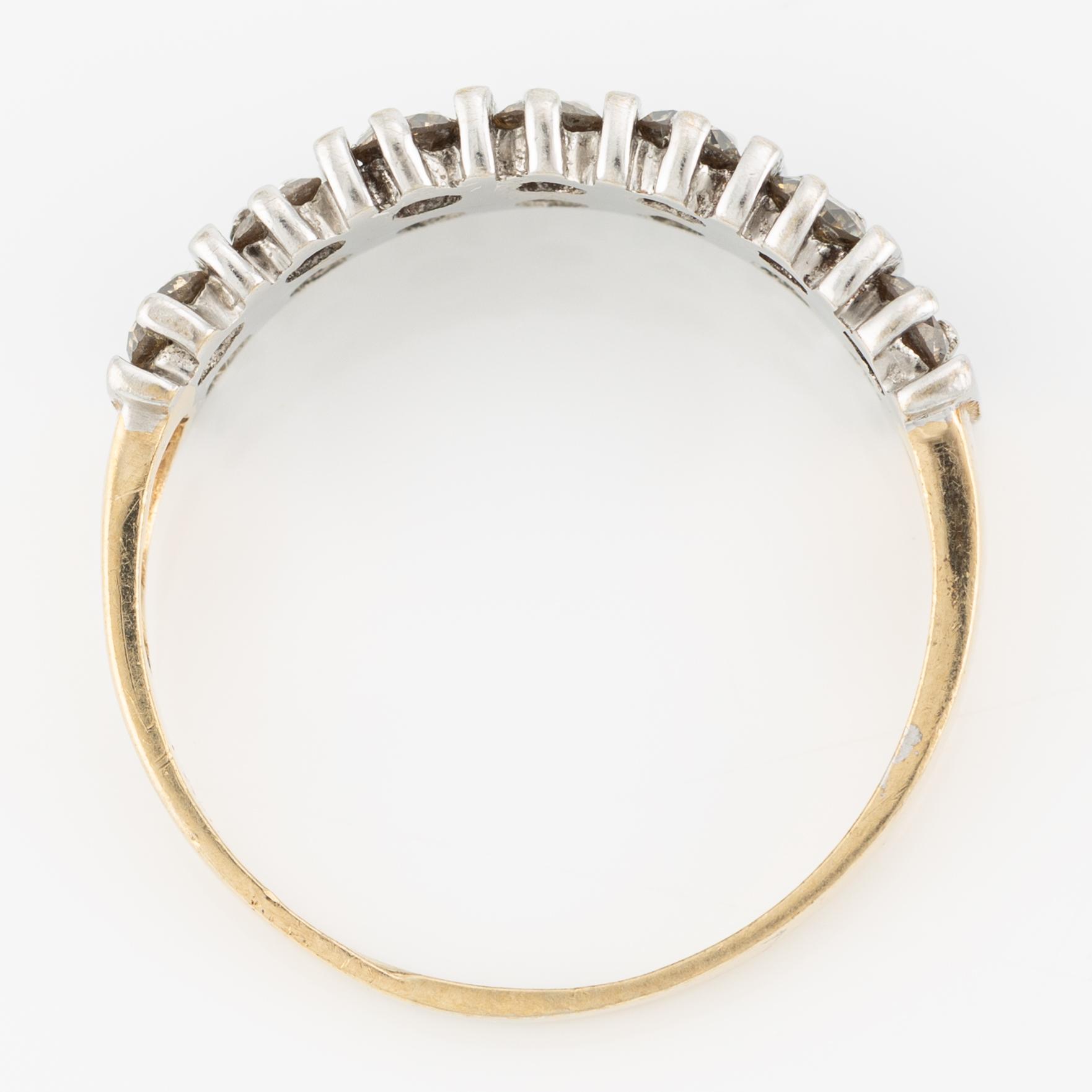 Ring  tvåradig med gula briljantslipade diamanter.