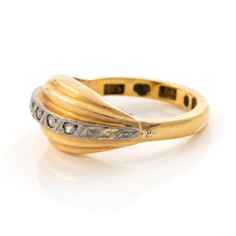 Ring, 18K gold with small white stones.