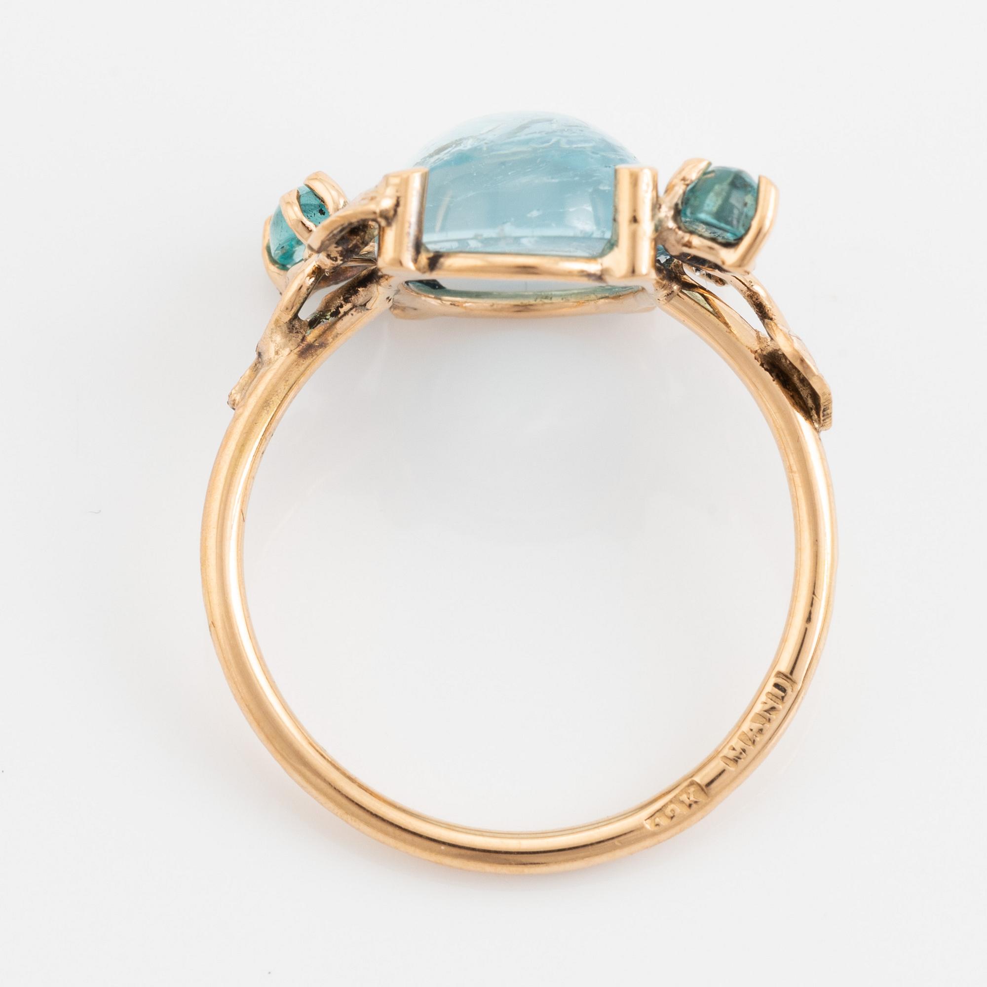 Cabochon cut topaz, apatite and brilliant cut diamomnd ring.
