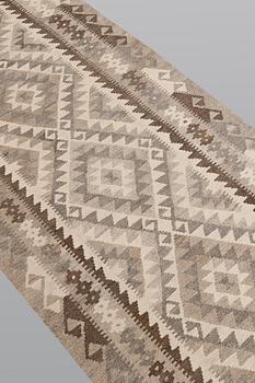 A Kilim runner, approx. 398 x 85 cm.