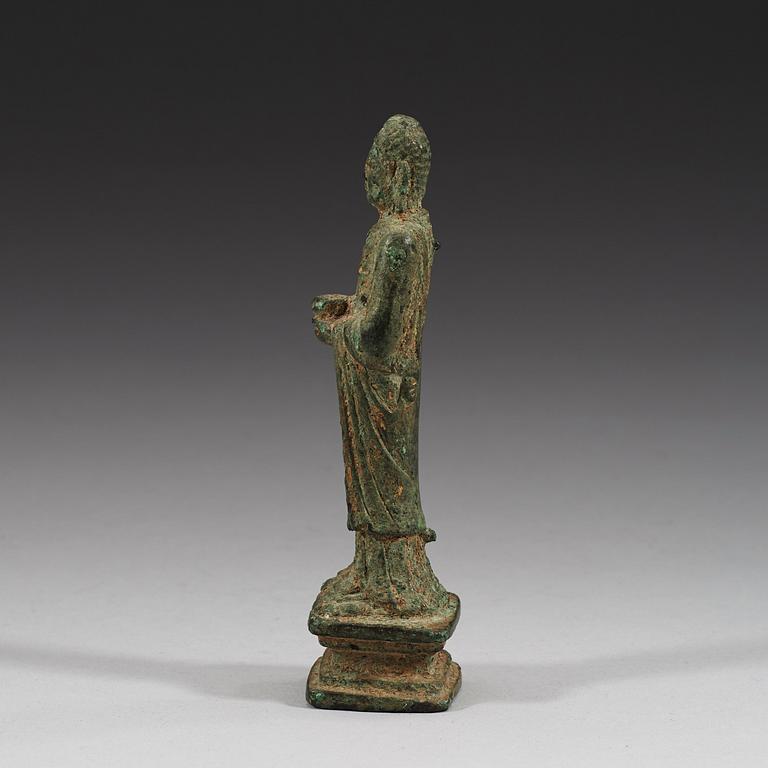 A standing bronze Buddha, presumably Tang/Liao dynasty (618-1125).
