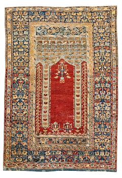 280. A RUG, an antique Anatolia, probably Gördes, a prayer rug, ca 177 x 124,5 cm (as well as flat weave at the ends 3 and 1.