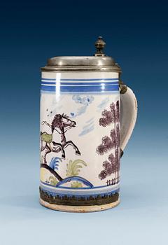 1209. A pewter mounted faience tankard, 1780's, presumably Bayreuth.