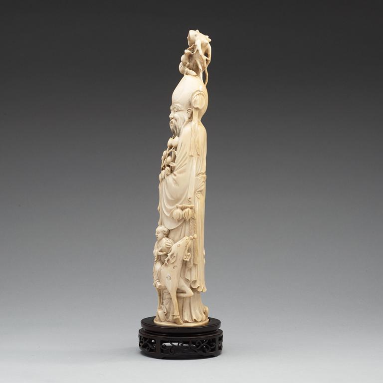 A carved ivory sculpture of Shoulao, Qing dynasty, 19th Century.