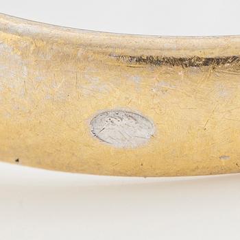 Ring 18K gold with round brilliant-cut diamonds.