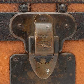 Louis Vuitton, orange Steem Trunk from the early 20th century.