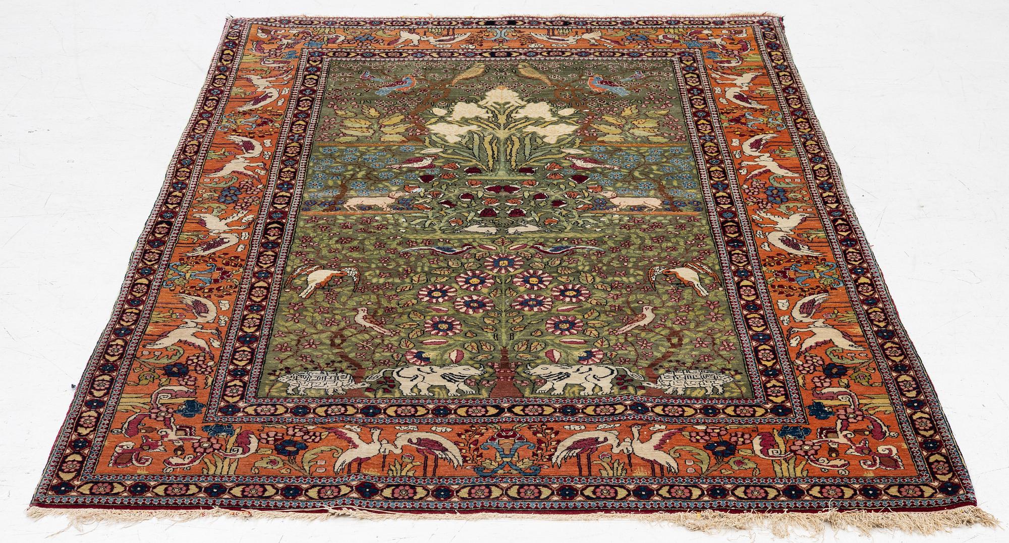 An antique Mobarekeh rug, central Persia, c. 230 x 130 cm.