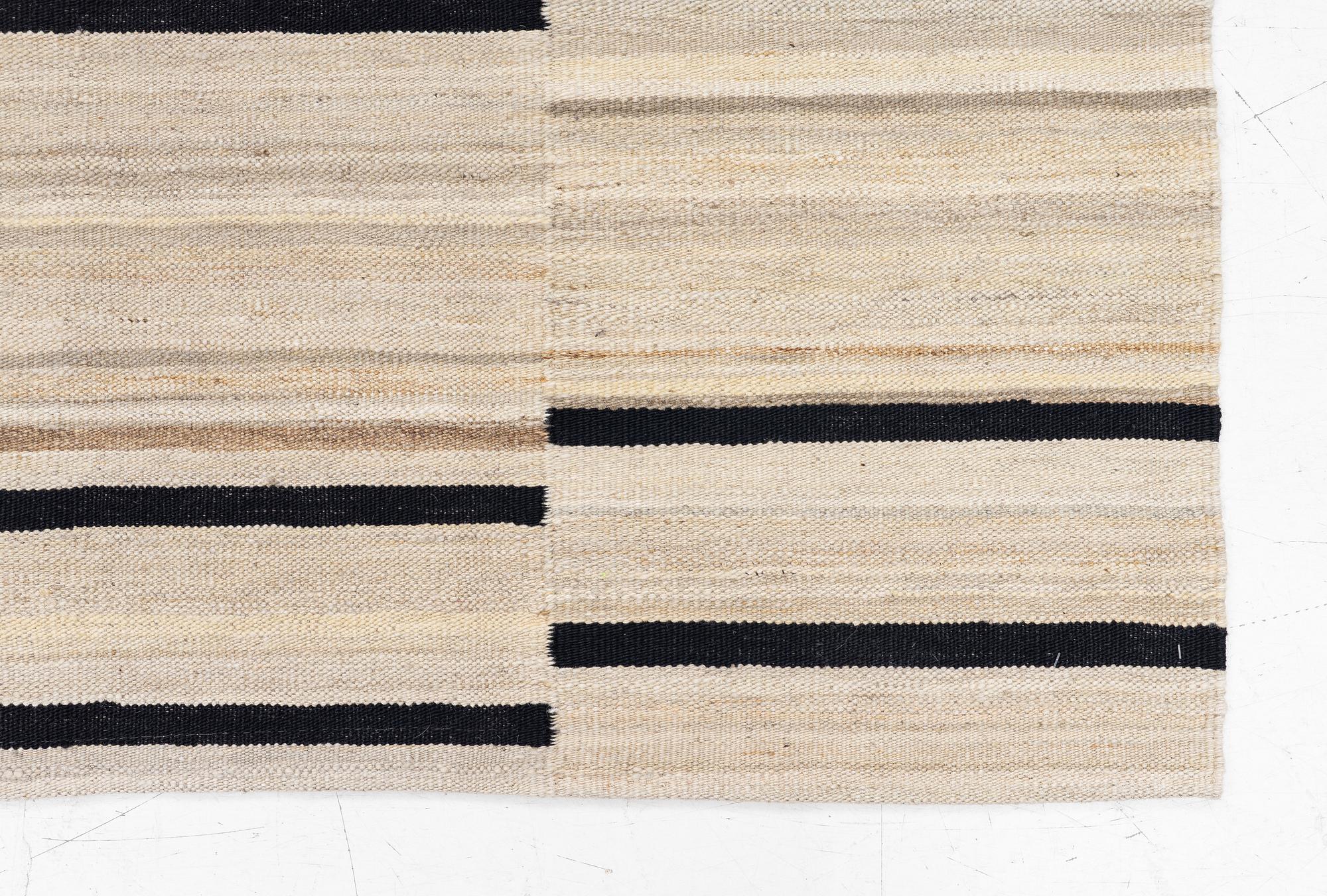 A Kelim rug, c. 195 x 162 cm.