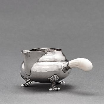 Georg Jensen, a three pieces coffee and tea service, "Blossom", Copenhagen Denmark 1915-21 830/1000 silver. Design nr 2,