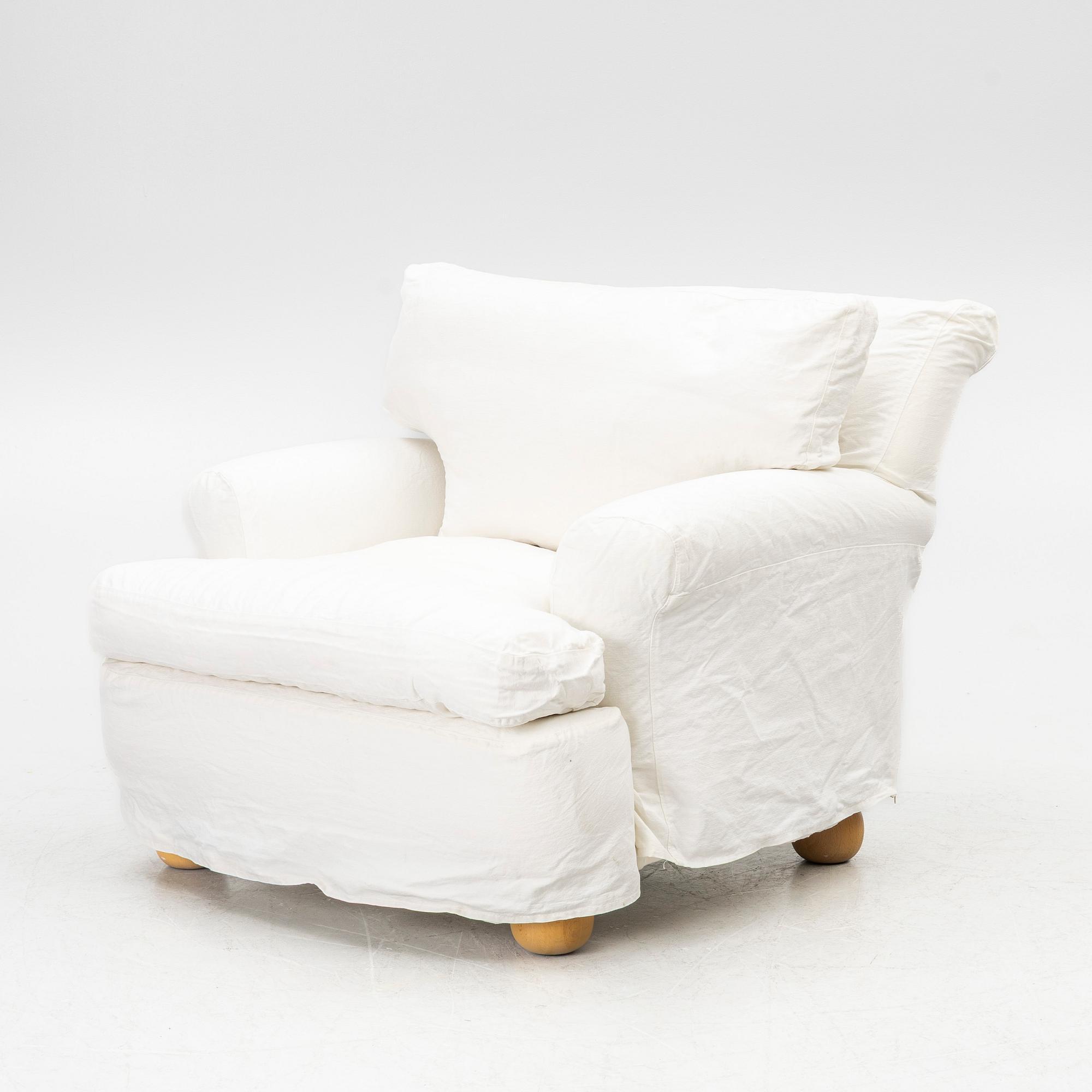 An armchair, contemporary.