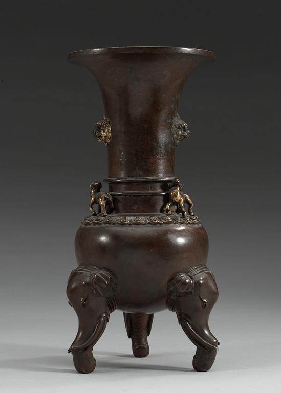 A gilt bronze vase, Qing dynasty with Xuandes six character mark.