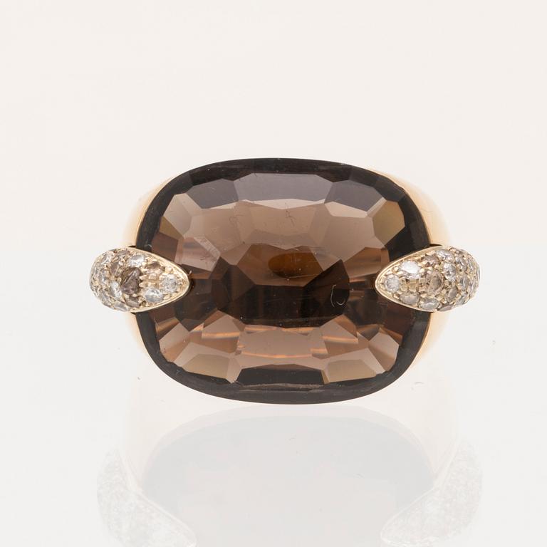 An 18K gold Pomellato "Pin Up" ring set with smoky quartz and round brilliant-cut diamonds.