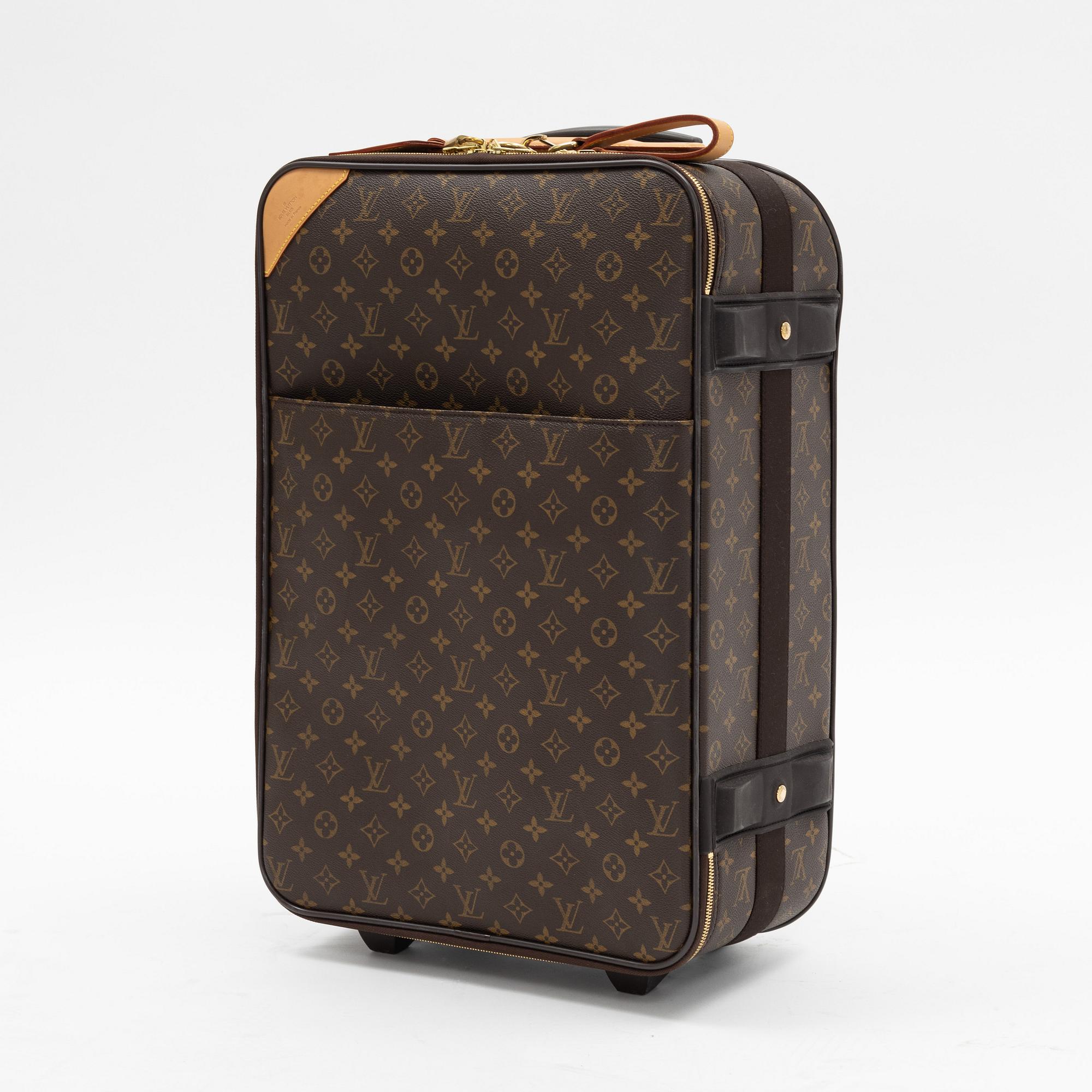 Louis Vuitton, a monogram canvas 'Pégase 60' suitcase, 2004.