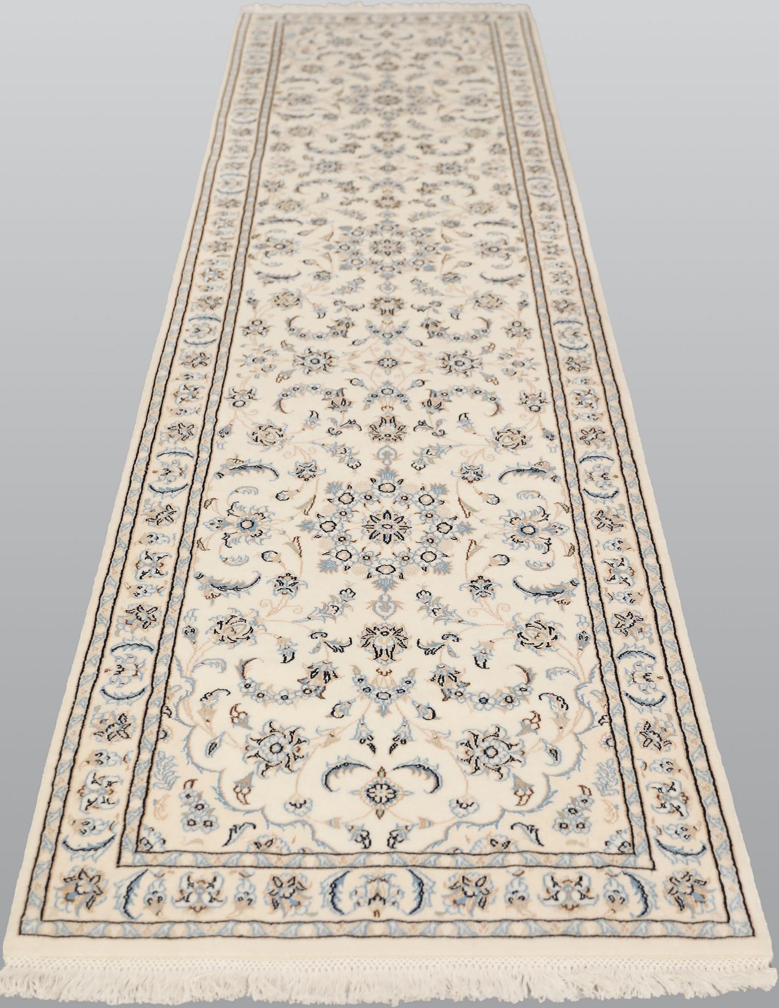 A Nain runner, part silk, so called 9LAA, c. 315 x 81 cm.