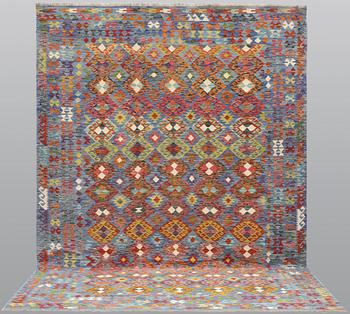 A Kilim carpet, approx. 350 x 250 cm.