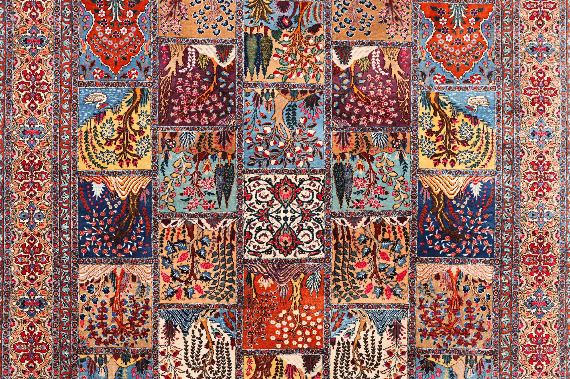 A Kashmar carpet, c. 387 x 297 cm.