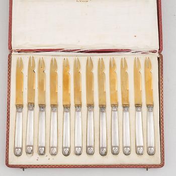 Twelve French Parcel Gilt Silver Seafood Knives, mark of Louis Coignet, Paris 1889-93.