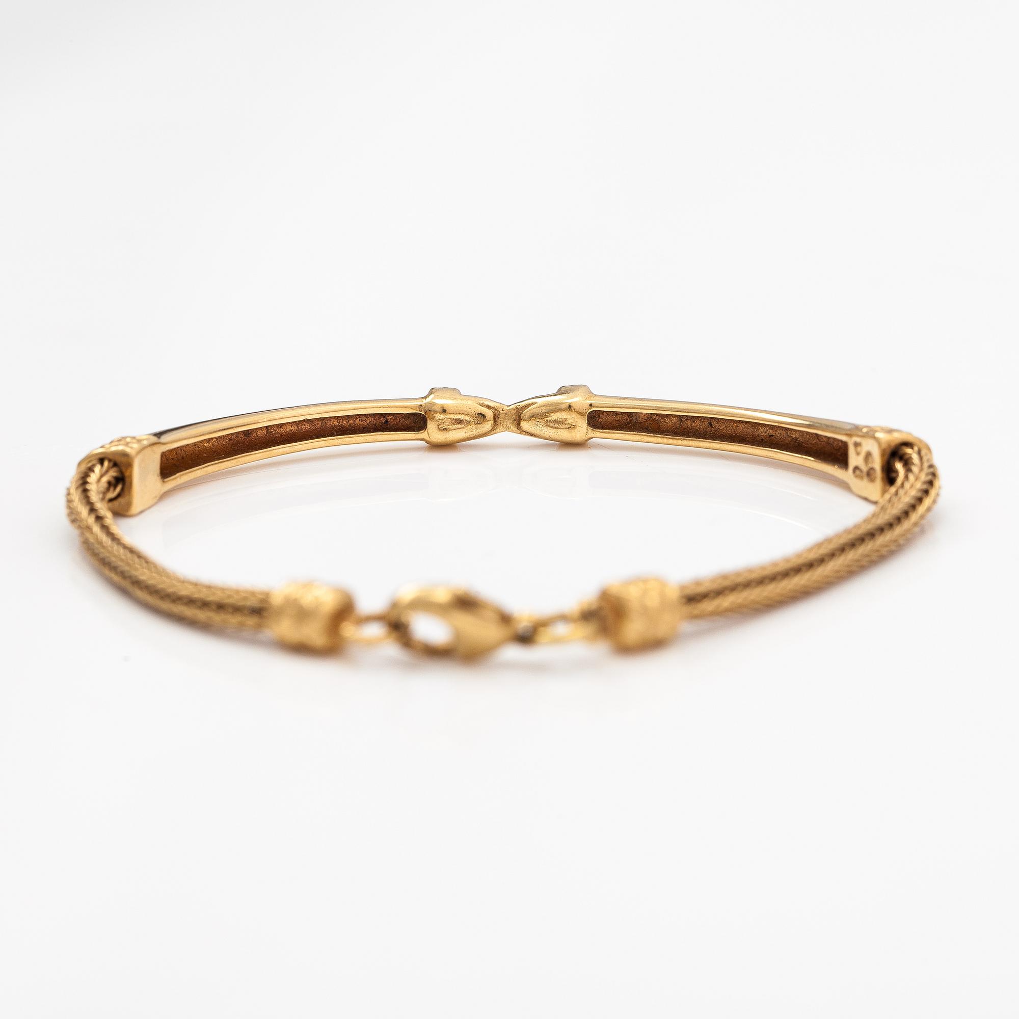 An 18K gold bracelet "Moose head". Kalevala Koru, Helsinki 1999.