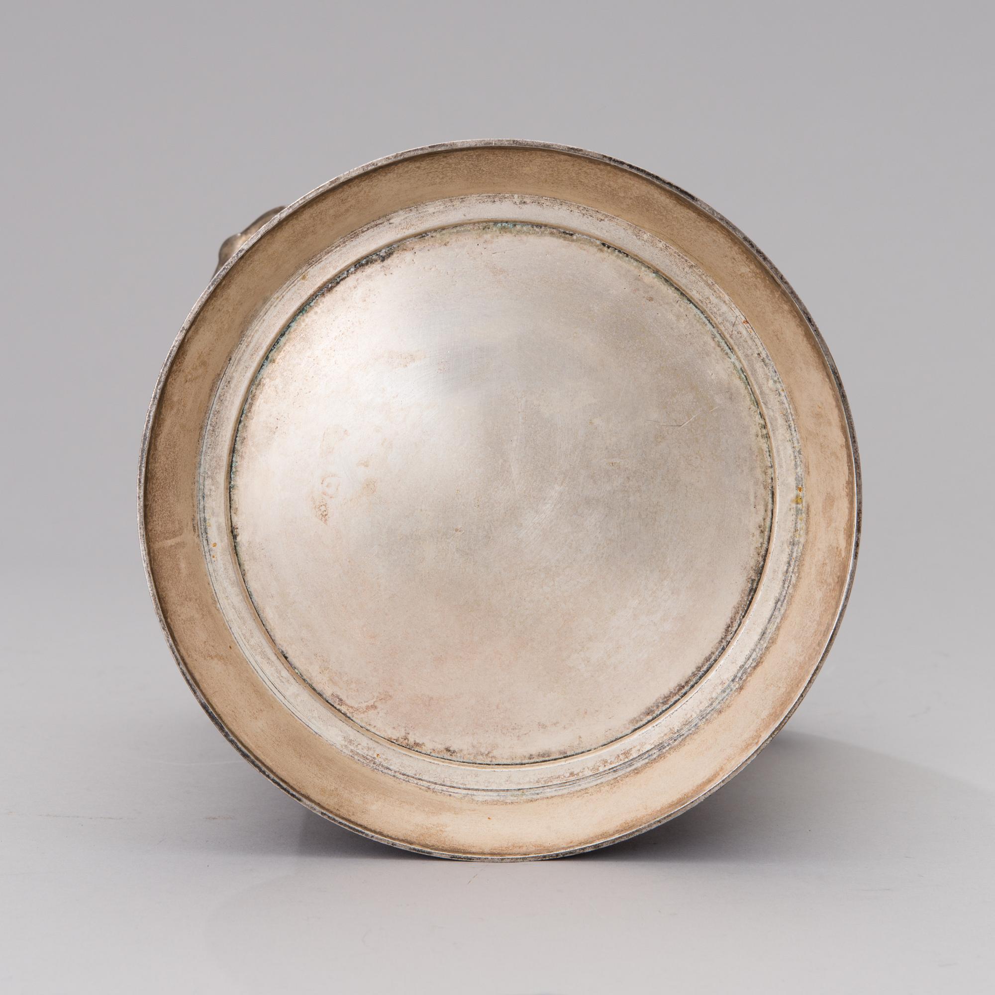A Louis Roederer champagne cooler of silver plated brass.