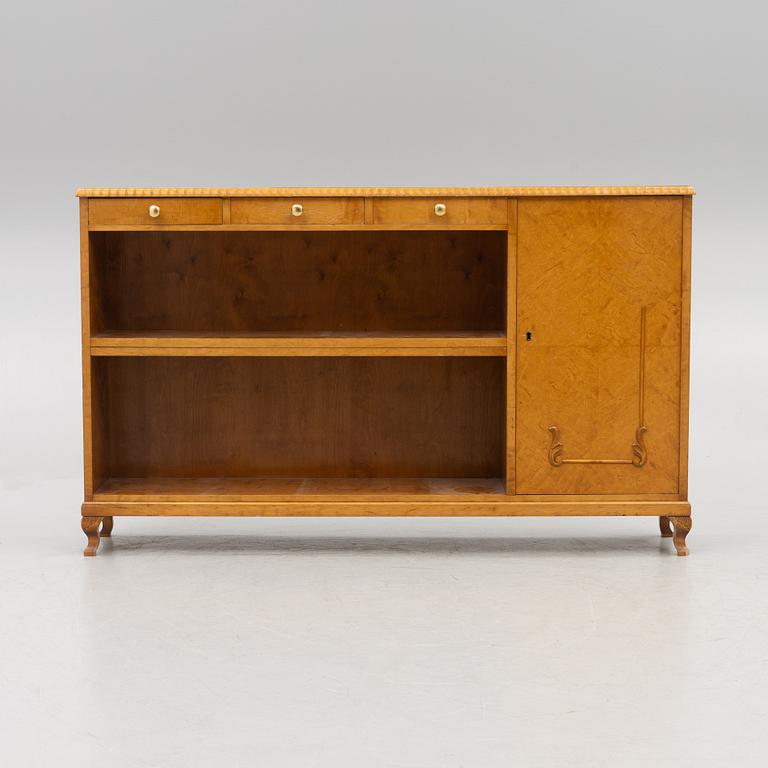 A bookcase with cabinet, 1940's.