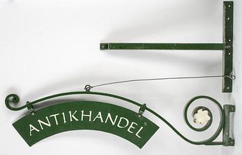 VÄGGSKYLT, smide, 1900-talets första hälft.