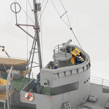 A wooden scalemodel of the Swedish minesweeper 'HMS Ulvön', built by Ingvar Lyckhammar.