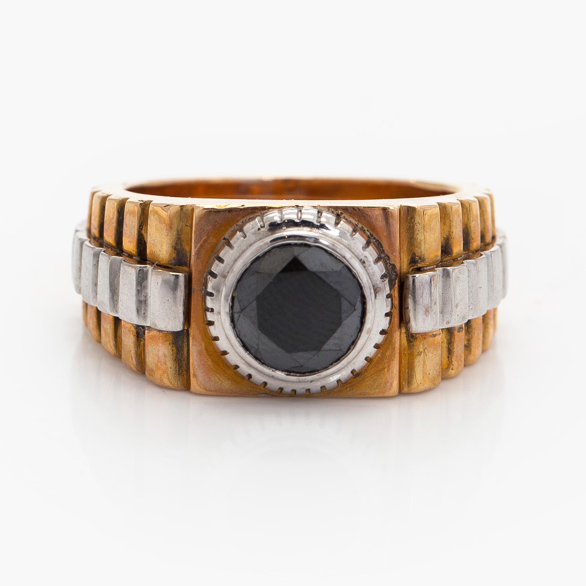 Ring, briljantslipad svart diamant, 18K guld och vitguld.