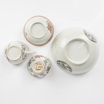 A group of four 18th Century cups, Japan, China and Europe.