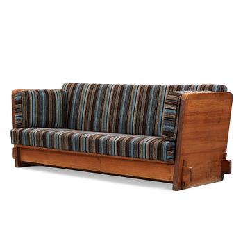 255. Axel Einar Hjorth, a stained pine "Lovö" sofa, Nordiska Kompaniet, Sweden 1930's.