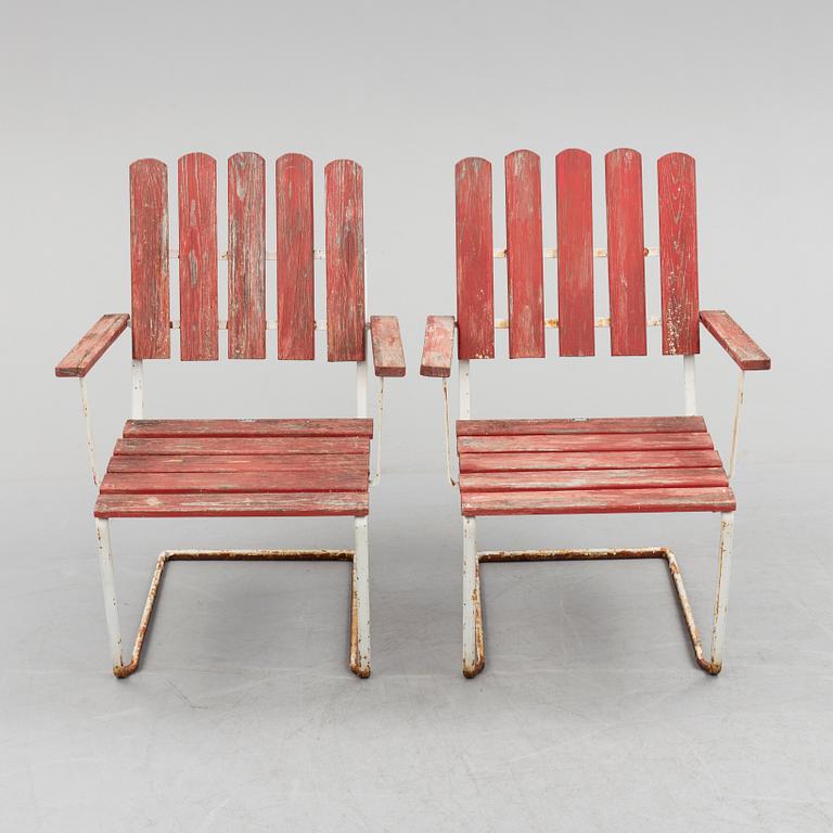 A pair of mid 20th century garden armchairs by Grythyttan stålmöbler.