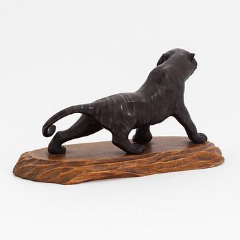A bronze okimono/sculpture in the shape of a tiger, first half of the 20th Century.