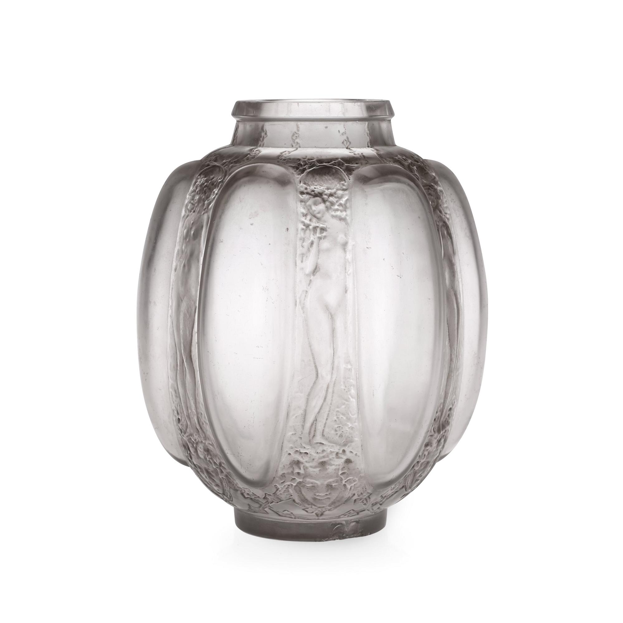 A René Lalique 'Six figurines et masques' glass vase, France 1920's-30's.