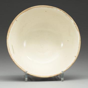A brown and cream glazed bowl, presumably Song dynasty (960-1279).