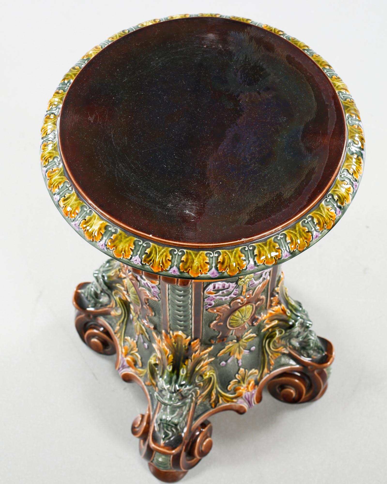 A pot on a pedestal in ceramics made by Rörstrand in the years between 1884-1890.