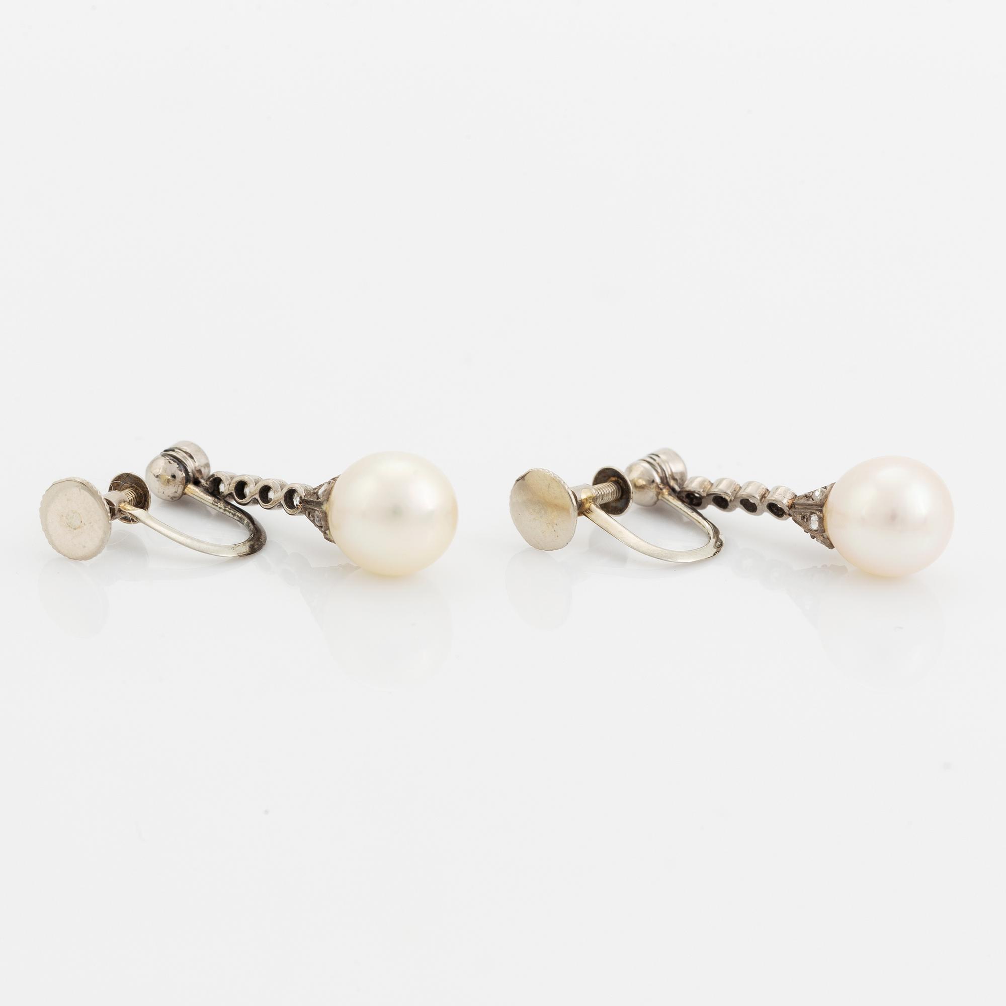 Old cut diamond and pearl earrings.