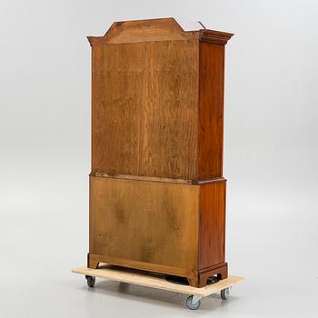 A vitrine cabinet from Åmells, dated 1974.