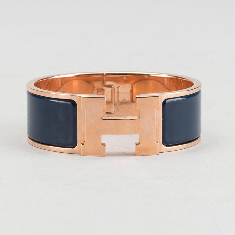A Hermès "Clic-H" bracelet.