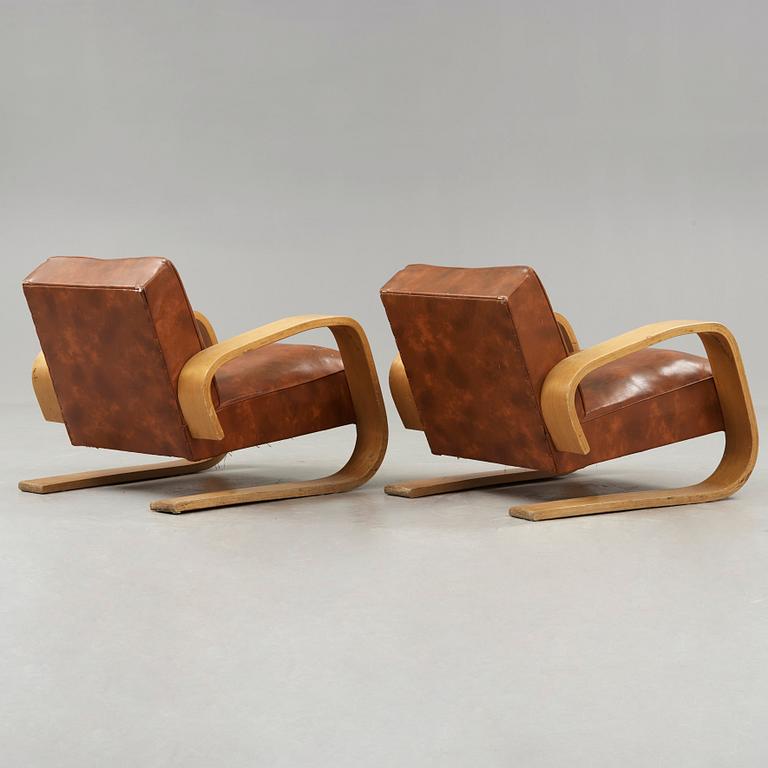 Alvar Aalto, a pair of 'tank chairs' model 400, Huonekalu-ja Rakennustyötehdas Oy for Artek, Finland 1940's-50's.