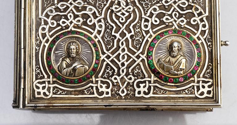 A Russian parcel-gilt silver book cover, mark of Sergei Vyerkovthyev, St. Petersburg 1873-1874.