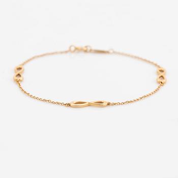 Tiffany & Co, an 'Infinity Endless' 18K bracelet.