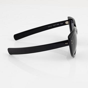Oliver Goldsmith, a pair of black "Y-not" sunglasses.