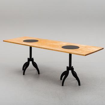 A  dining table by Jonas Bohlin för Källemo.