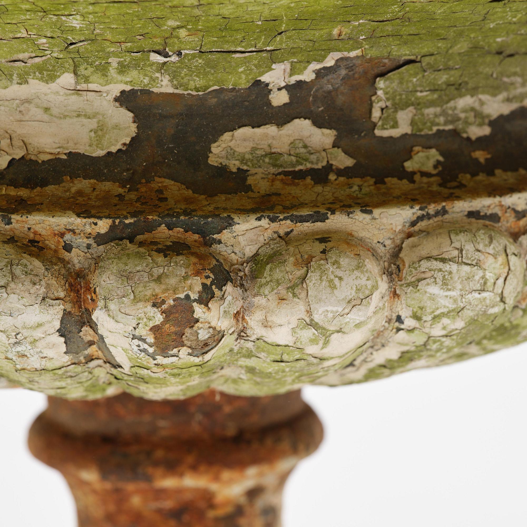 A Swedish cast-iron garden urn, late 19th century.