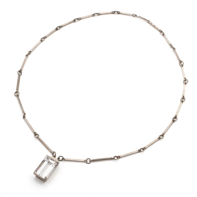Wiwen Nilsson, Pendant, sterling silver with faceted rock crystal, Lund 1944.