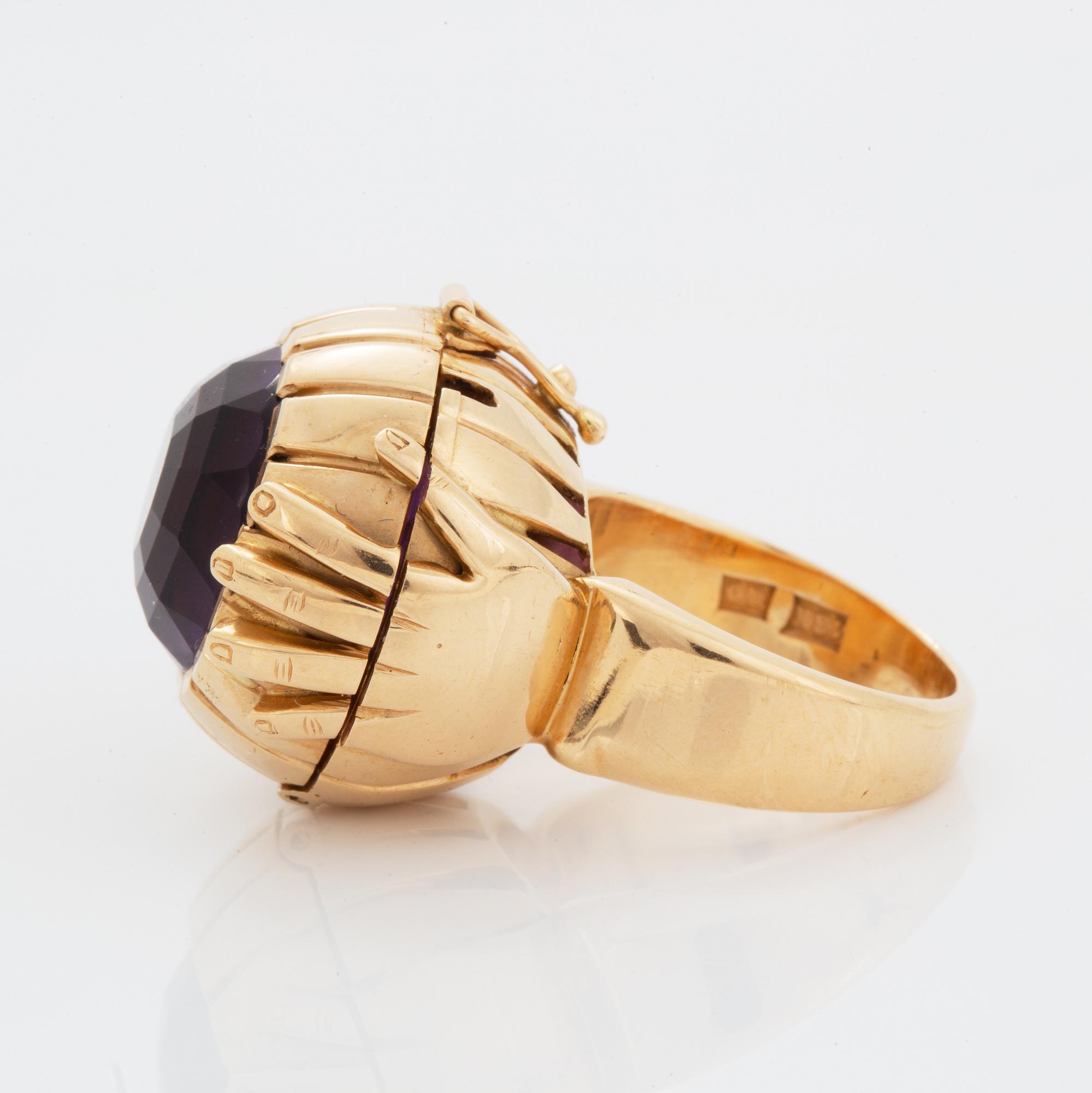 Amethyst ring with locket.