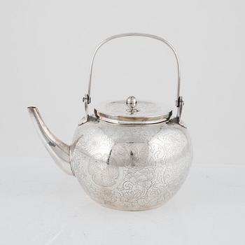 A Japanese Silver Teapot, second quarter of the 20th Century.