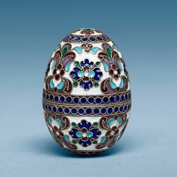 A Russian late 19th/early 20th century silver-gilt and enamel egg.