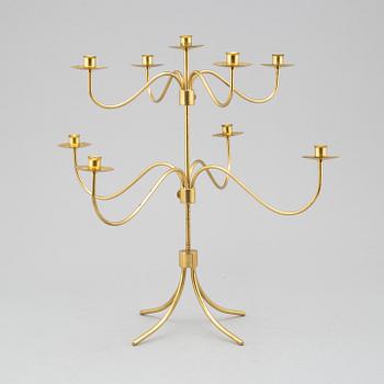 A BRASS CANDELABRUM, second half of the 20th century.