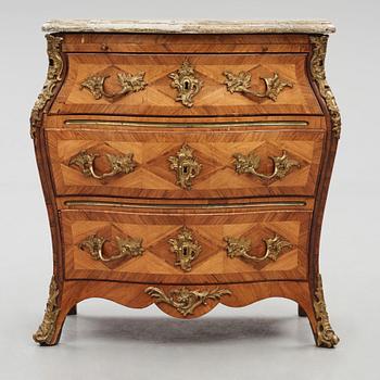 A rococo parquetry and gilt-brass mounted commode by C. Linning (master 1744-1779).
